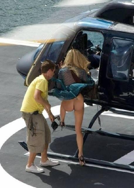 Aeronautical Quiz 
  
 They say it is common sense but here is a Clue: Just remember that a helicopter's blade (in cross-section) is shaped like an airplane's wing, and both catch air giving lift..now answer the question...