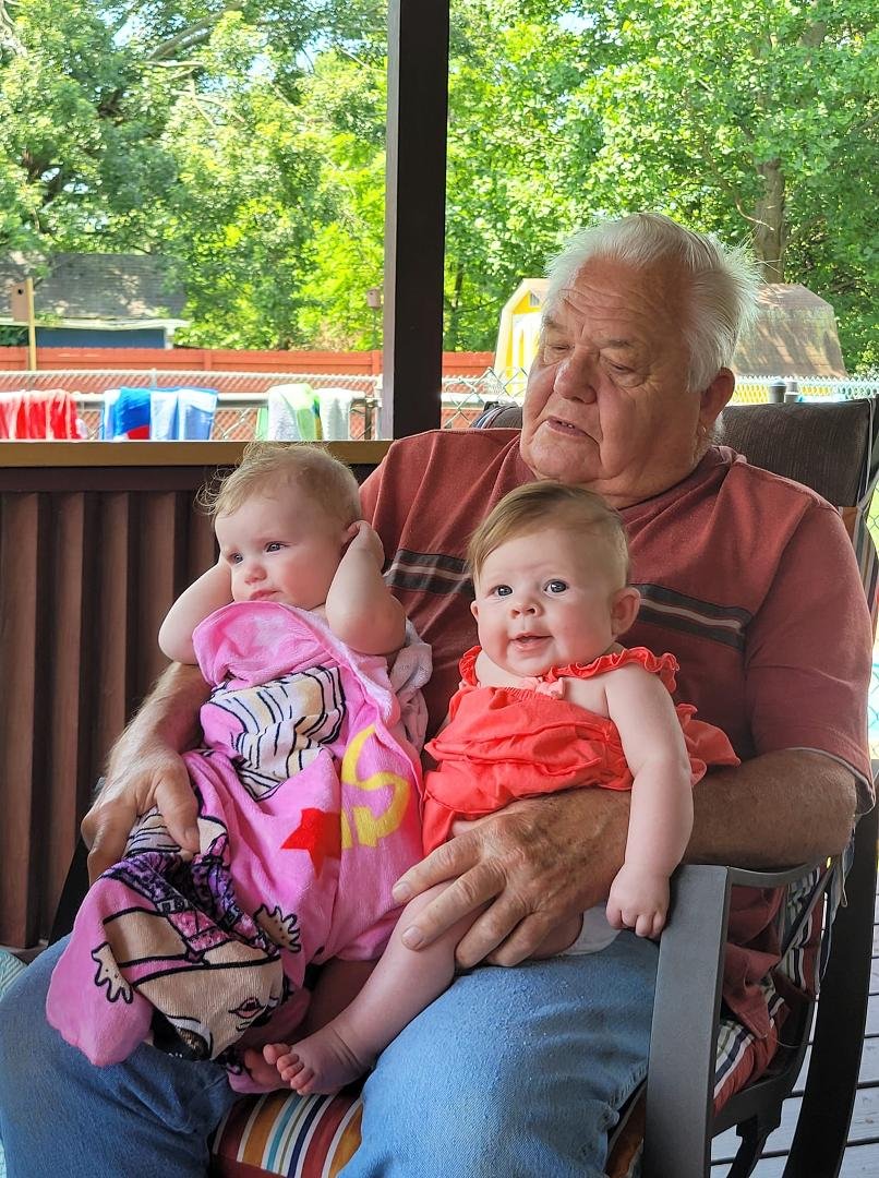 Dad with his girls, Kora and Lucy.