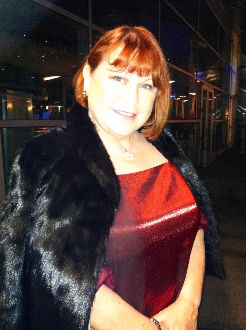 This is a picture of me at the Breaking Dawn Part II event on Friday Night at Midnight!
Looks like I was having fun pretending to be on the “Red Carpet”. Hey we even wore “mink”.
Movie was good too.