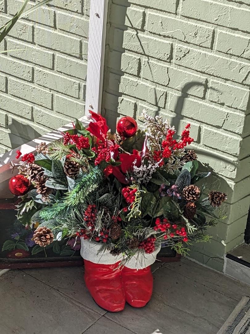 Every year, this is one of my favorite decorations to display. I fondly remember Betty Farley from my first job at Welling who made the Santa boots for everyone in the office, along with other ceramics I treasure.