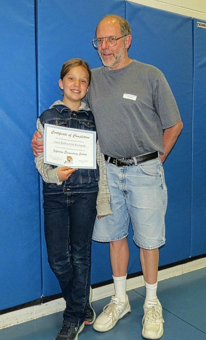 Proud Grandpa Wayne with the graduate.
