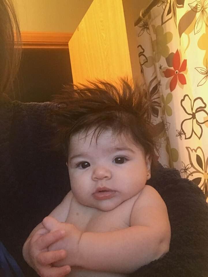 Bella took one look at Santa and it raised her hair. Love ❤️ this little one