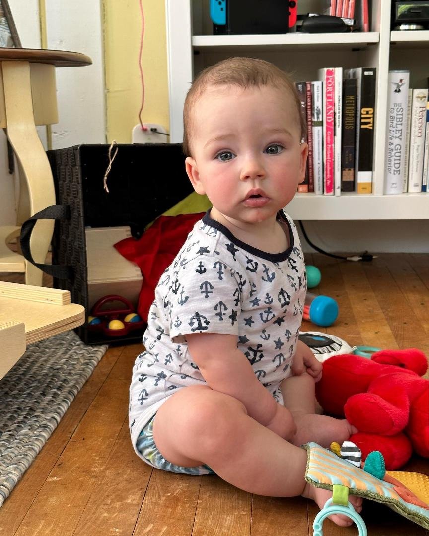 9 months old and new tricks every week. Sits like a champ and pulls himself up to stand. Laura and Chad are doing great!