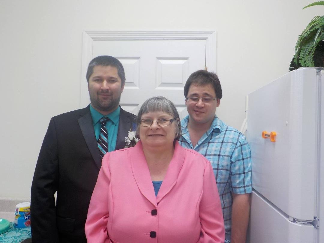 I'm not posting any actual wedding photos tonight, because I want the bride and groom to look at them first. There might be one they don't like and don't want made public. But, I got a photo of me with my two handsome bo