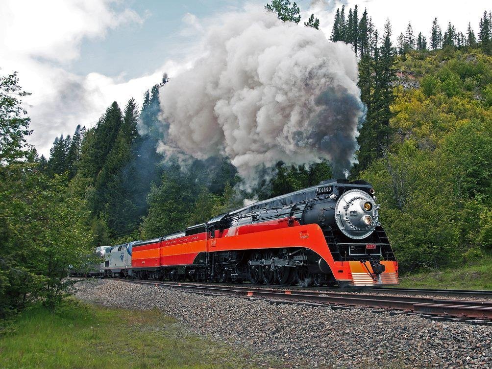 June 25, 2011, as part of that years NRHS Convention held un Tacoma, WA, 4449 ran over Stampede Pass to Easton and back. Seen here at the top of Stampede on the eastward trip.