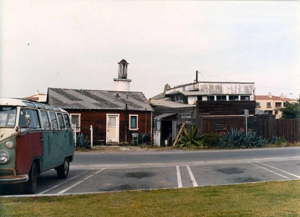 A view of the Manor from the green belt and the shack next door where Chris Marshall lived. That is his VW Van on the left.