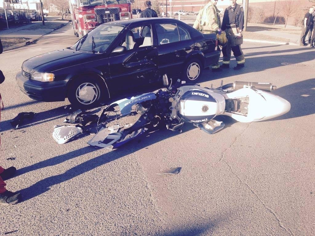 Bad day for me...made it out alive!.....Oh yah that's my bike. And that is a Chinese mans car hmmmm stop sign?