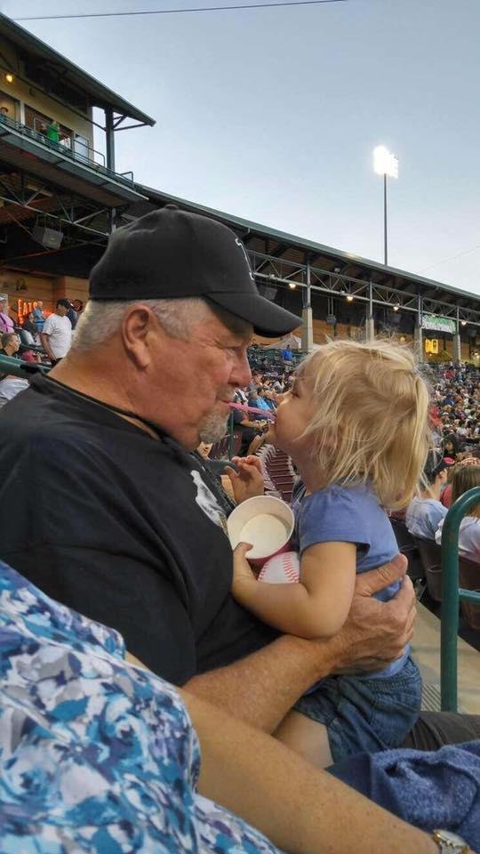 Me and Scarlett sharing ice cream at a Storm game.