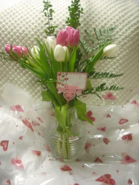 So. Lolly came from work with her arms loaded. More valentines for me! These beautiful flowers and food and a big fluffy valentines pillow. :) What a nice surprise.