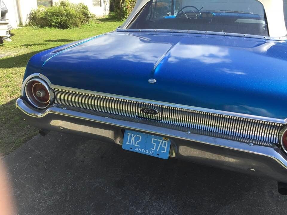 Thank you state of Florida for matching your antique plates with the color of my car!