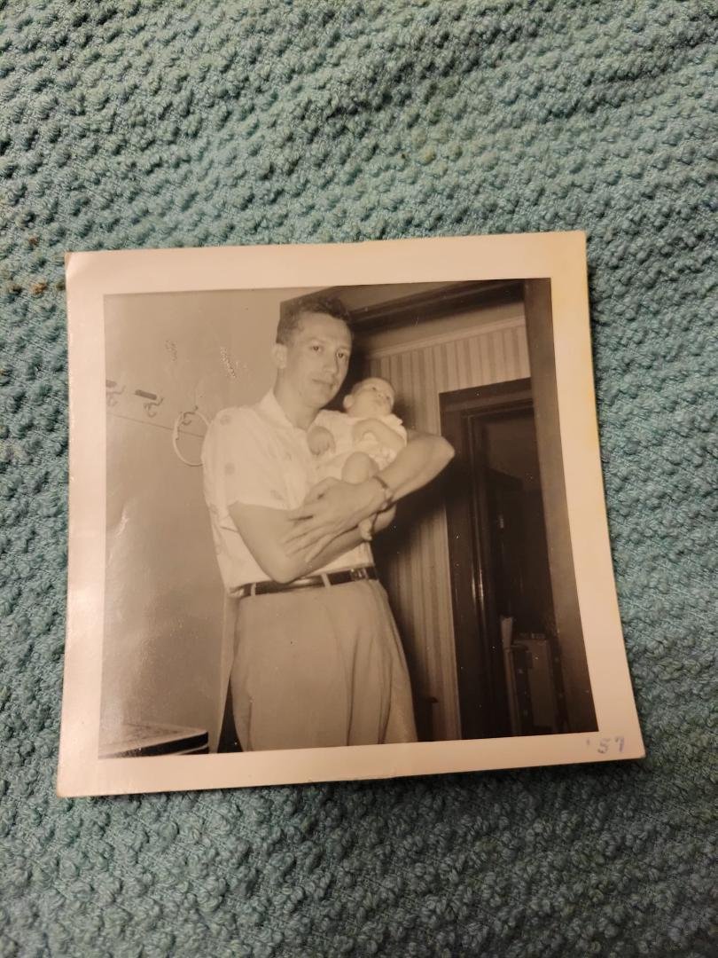 Happy heavenly birthday to my dad.... George Wesley Newlin. Holding me here. He would have been 95 today.