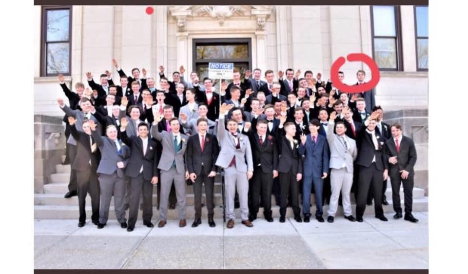 This photo, since deleted, pictures a group of students from the Baraboo School District giving the “Heil Hitler” sign at the Spring Prom. I saw the comment from Steve Schmidt and found this. Twitter accounts are popping up