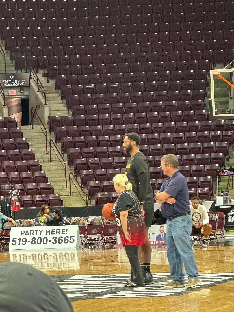 "All right, we're going to run down to the end of the court, make a layup shot and the first one back here wins".