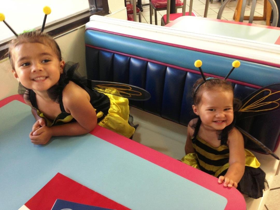 Granddaughters Maggie and Belen in their Bumble Bee Halloween outfits in Hawaii.