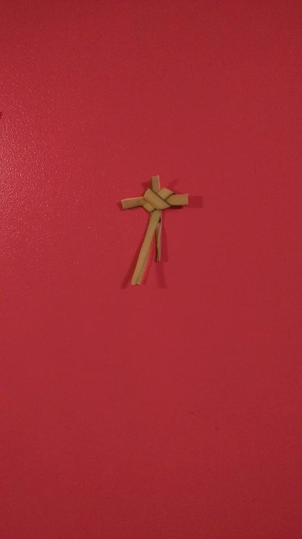 This is the cross that Mark made from the palm I brought home from church today. I think he did a pretty good job.