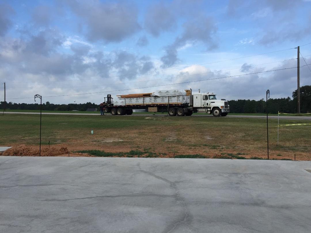 Its been a long time coming but the first truck of logs has arrived. We will have a shell built in the next few weeks. Dreams do come true.