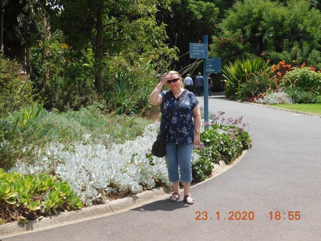 Gloria standing at Royal Botanical Gardens in Sydney,Australia!