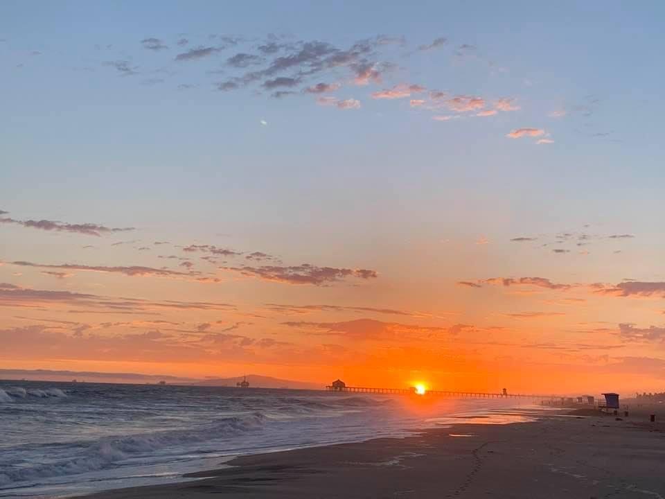 Another blazing sunset in Huntington Beach.
It looks like the HB pier is burning!
This was an extremely high tide. The wind was up, whipping the breakers into a froth, resulting in a thick haze diffusing the light,
