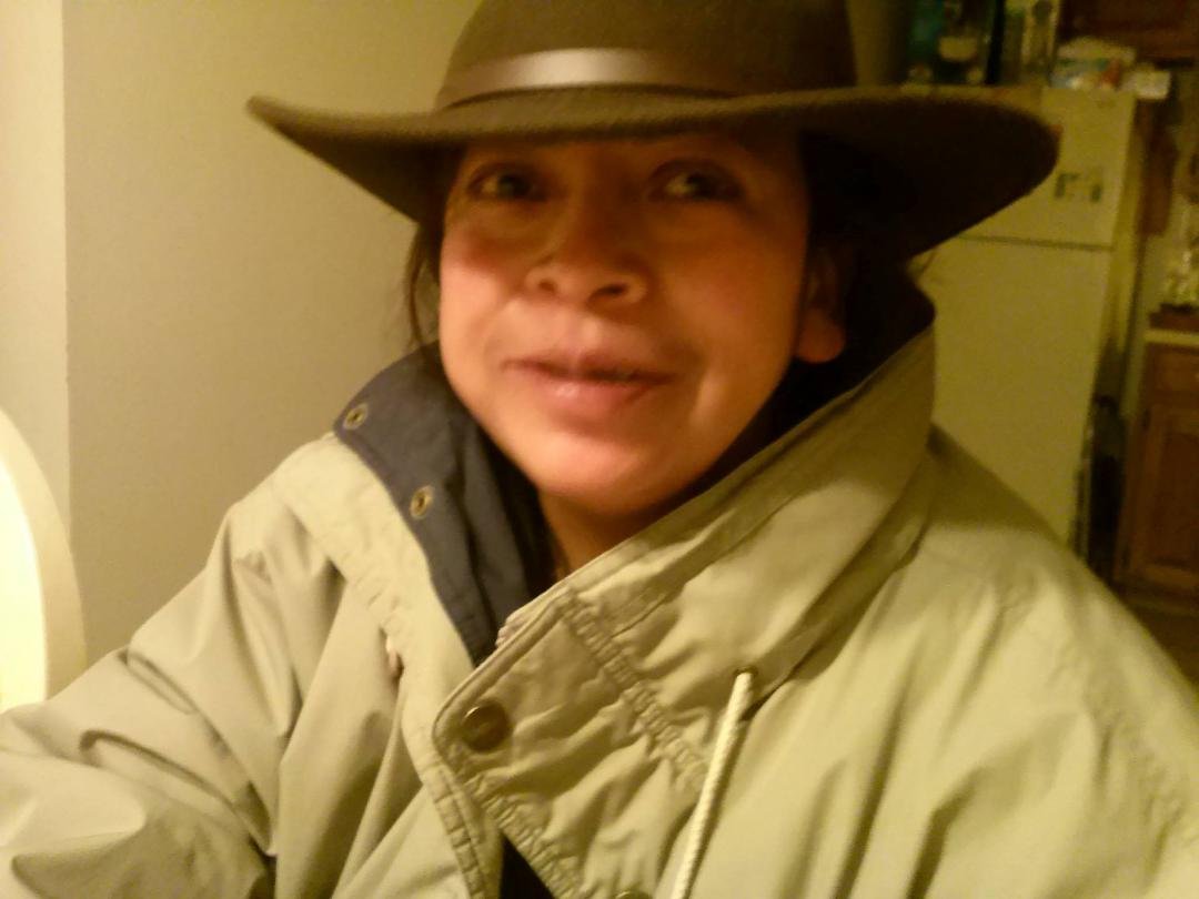 Veronica, bundled up in my coat & hat because of the freezing temperatures here. At least one of us was warm!