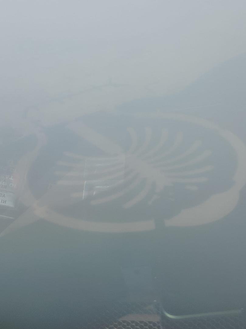 Flying over Dubai in a sand storm.