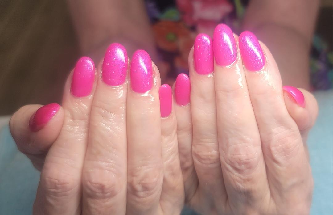 Got my nails done on Saturday. The name of the polish is "Pink Big". (OPI polish has really catchy names!) You can't tell from the picture but there is slight glitter in it.