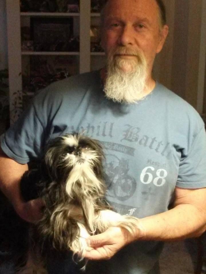 Ju wanted to share his new dog. Looks like bully. T's dog.
