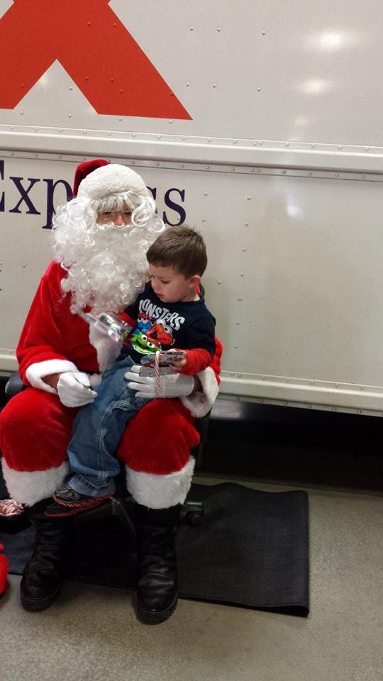 Tyler with Santa shhh don't tell him it's daddy