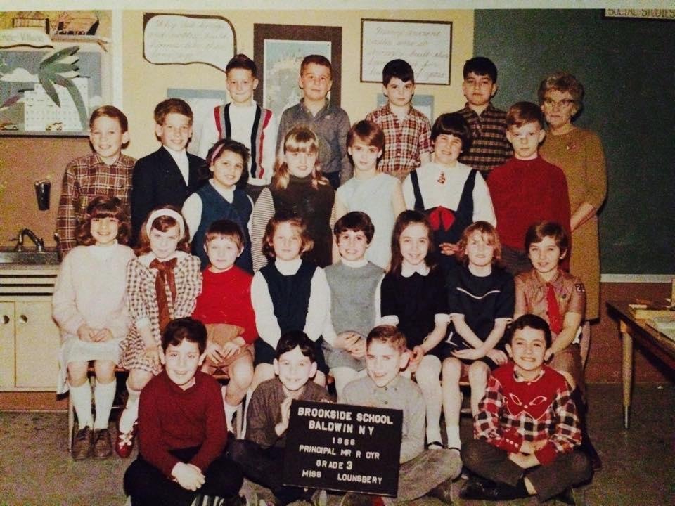Okay this one is a little easier 
I loved Miss Lounsbery's class she had been a teacher for about 30 or so years and she was fantastic! Everyday she would read to us Charlotte's Web, Willy Wonka and the chocolate factory ab
