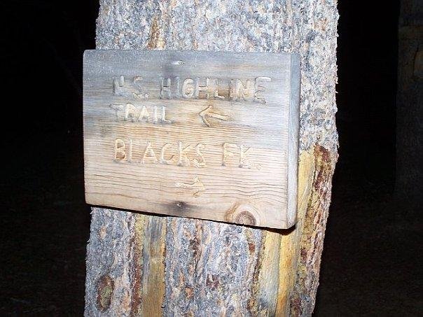 sign at the top of the deadly dreaded switchbacks a 1000 ft climp. so here take a right and go to red castle