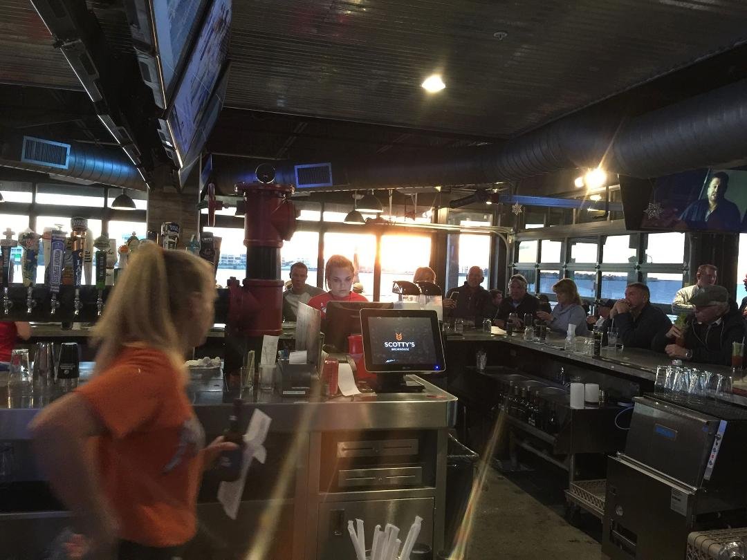 I love bars with a view of the sunset over river