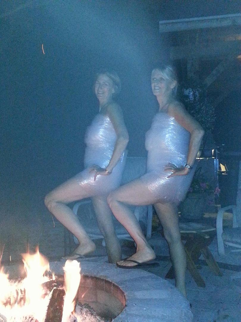 Cheryl and her sister Gloria came out to the fire pit wrapped in bubble wrap modeling for Dick and me.