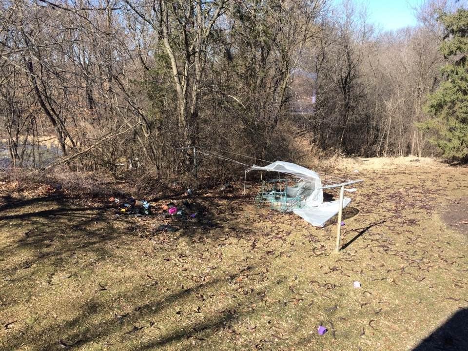 My greenhouse relocated to the back yard. Good catch, clothesline .
