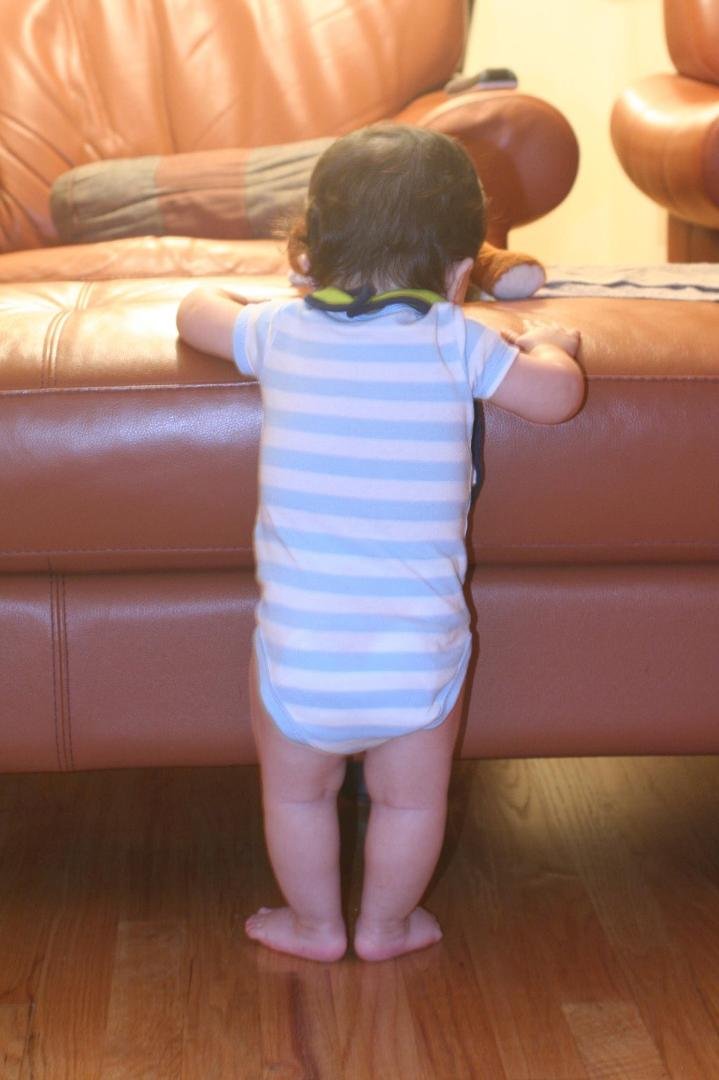 my grandson standing all by himself and dancing to music