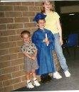 The three together at Robert's kindergarten graduation, Probably the last time Erin was taller than Robert!