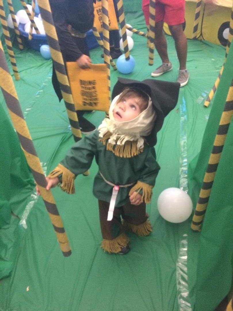 Grandson Zach - cutest scarecrow enjoying Halloween!