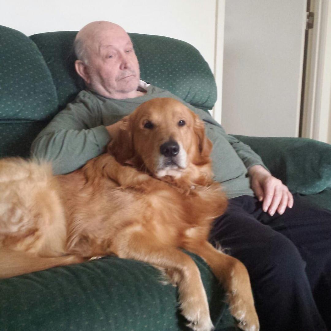 Grandpa Joyce  and Nelson just kicking back & watching the Cubs game.