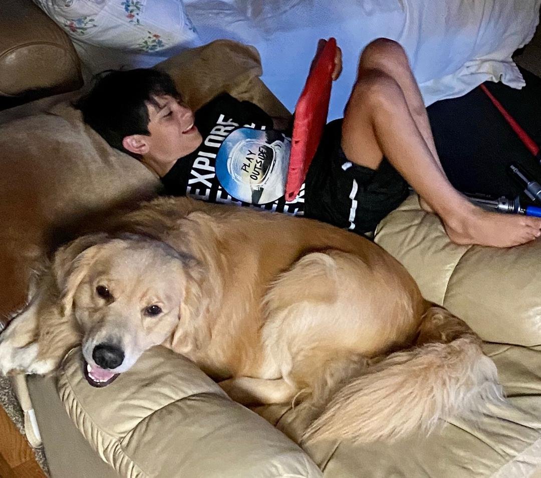 Our Grandson Zane and Nordy Relaxing