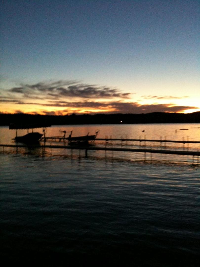 Tonight's sunset over Lake Leelanau, Michigan from my boat dock in front of the house.