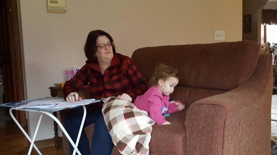 Grandma and river watching uncle Gary's tablet. (Rivers Christmas present)
