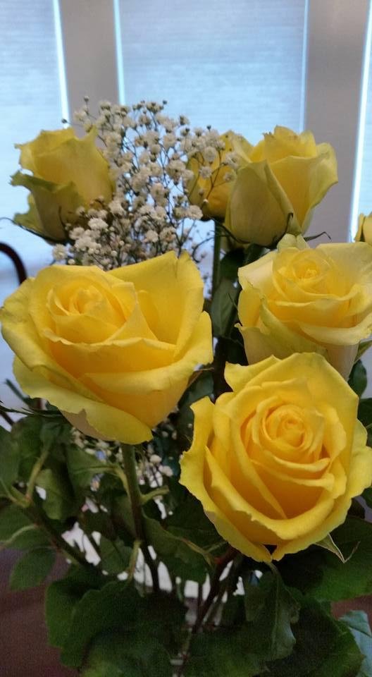 Beautiful yellow roses on my dining table!