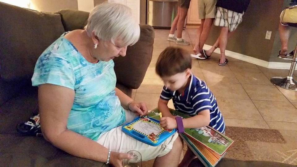 REID showing Grammy how this new toy works.