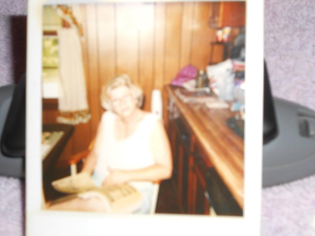 My Mama,reading her newspaper @ the table w/the kitchen window open.Loved to Pose for her Pics!