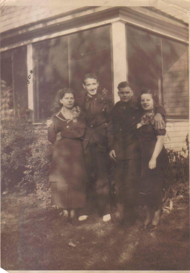 This is one of the few pictures I have of my dad, John Benzinger.
He's the tallest one here.  My mom is on the right.  The other two are Wenzlicks, and I think it was taken after their wedding in 1936.  Bee Wenzlick, can yo