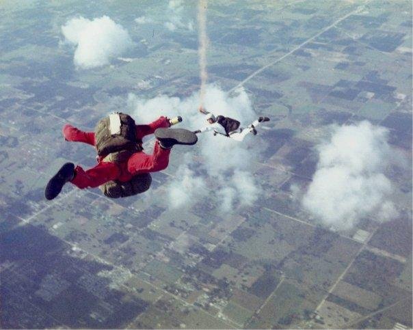 Dan in red, taken at 19,000 feet over Zephyrhills Fl. Oct of 1967 , my 250 th skydive.  It was VERY dold up there !