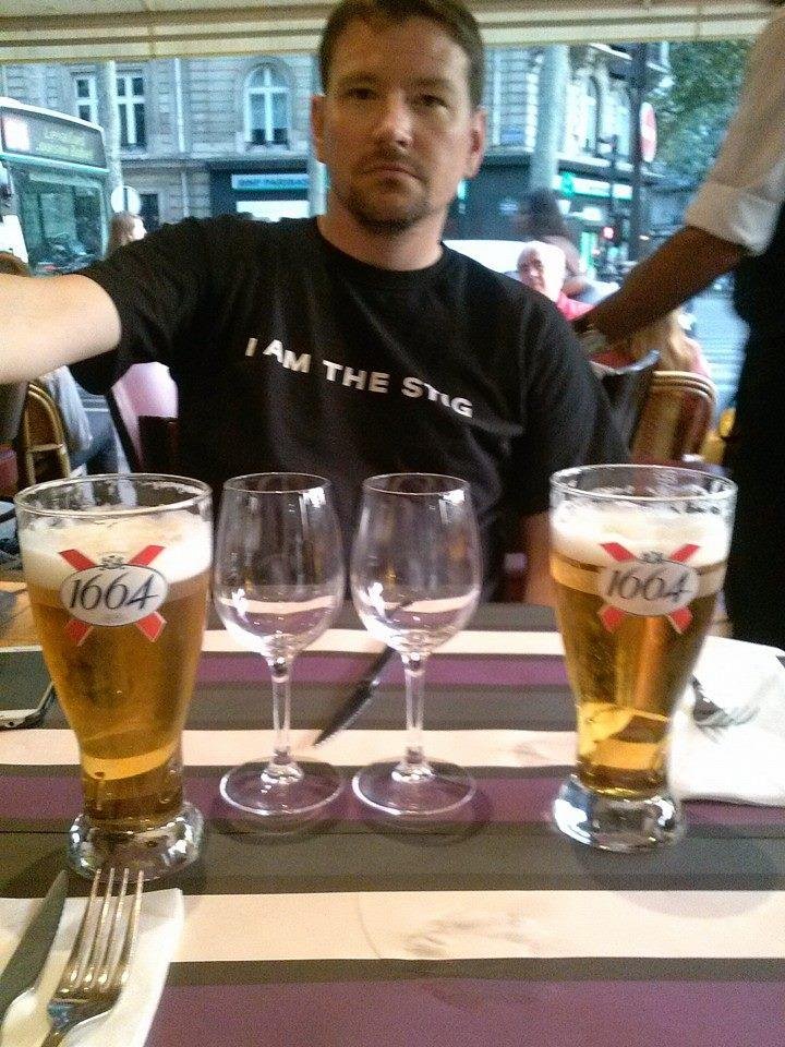 Having a pint with my son in France while visiting Normandy.