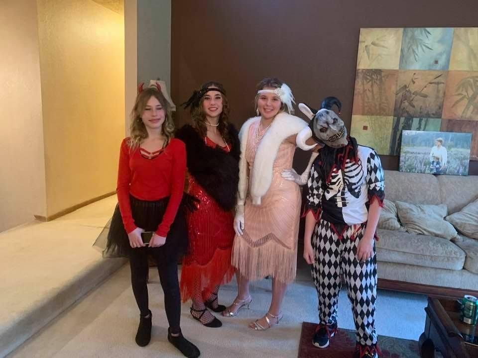 Urdahl Grandkids; devil girl, Joker, Flapper girl and friend (blonde girl) ready for Halloween.