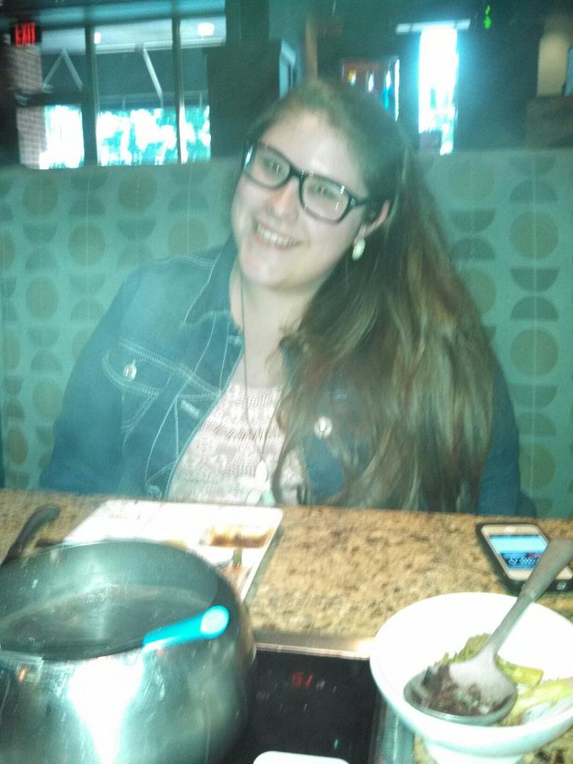 Our beautiful granddaughter on the day before her 21st birthday. Eating at the Melting Pot is a real new experience, and fun too!