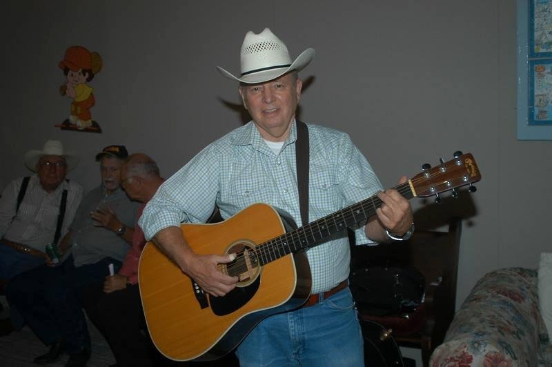 John Nickell at Pearl Bluegrass Jam with Roger Vierse, Wes Lum, and unknown person.