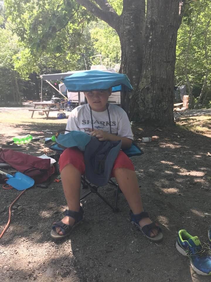 When u bring your kids camp chair from last year and realize he might have grown a little!