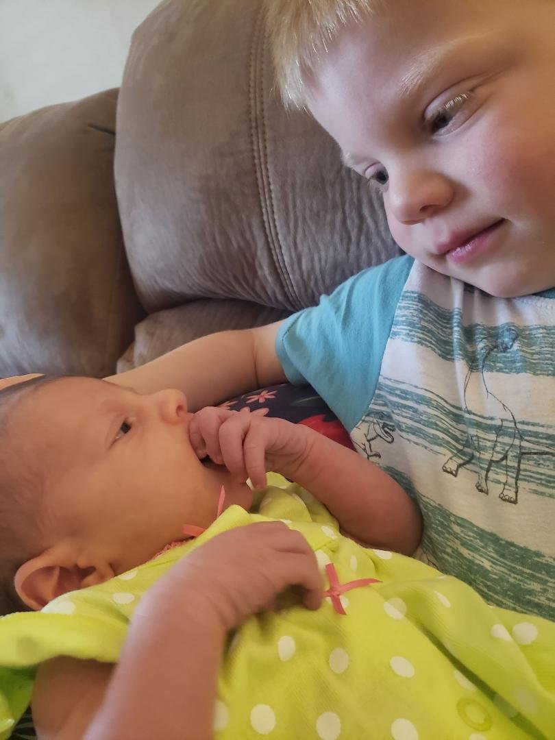 This big brother Lucas adoring new baby sister Clara Grace. He is 4 yrs old.